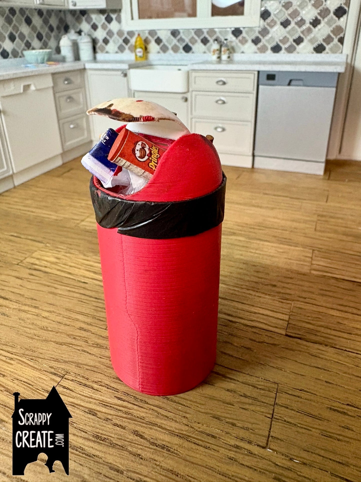 Dirty red bullet kitchen bin