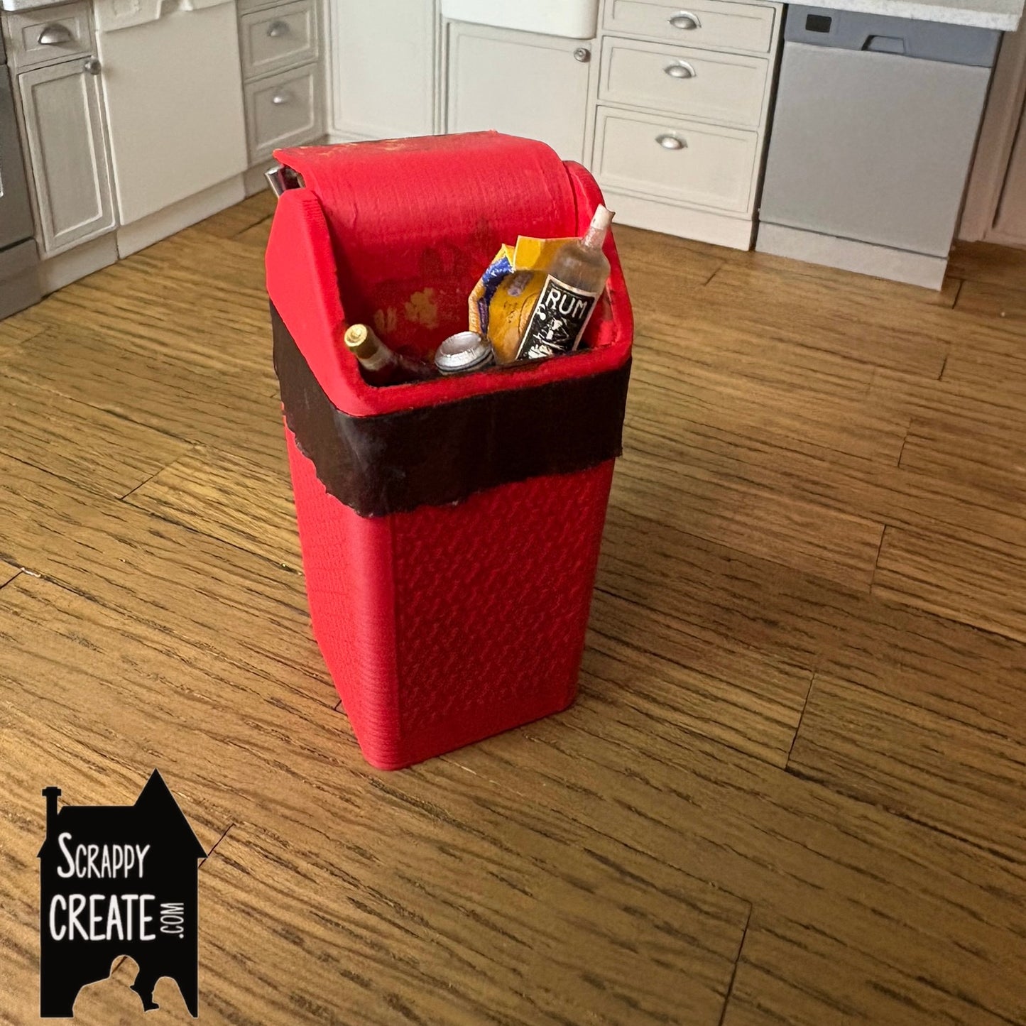 Dirty red kitchen bin