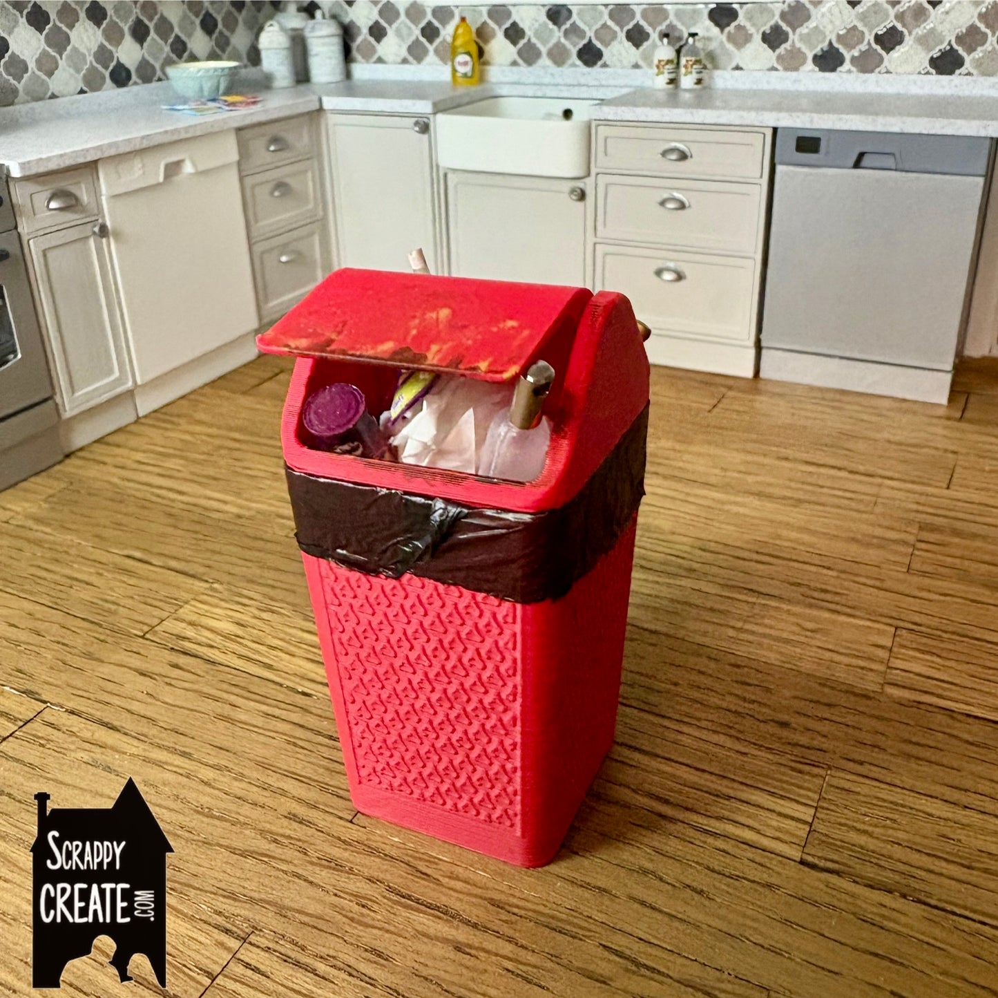 Dirty red kitchen bin