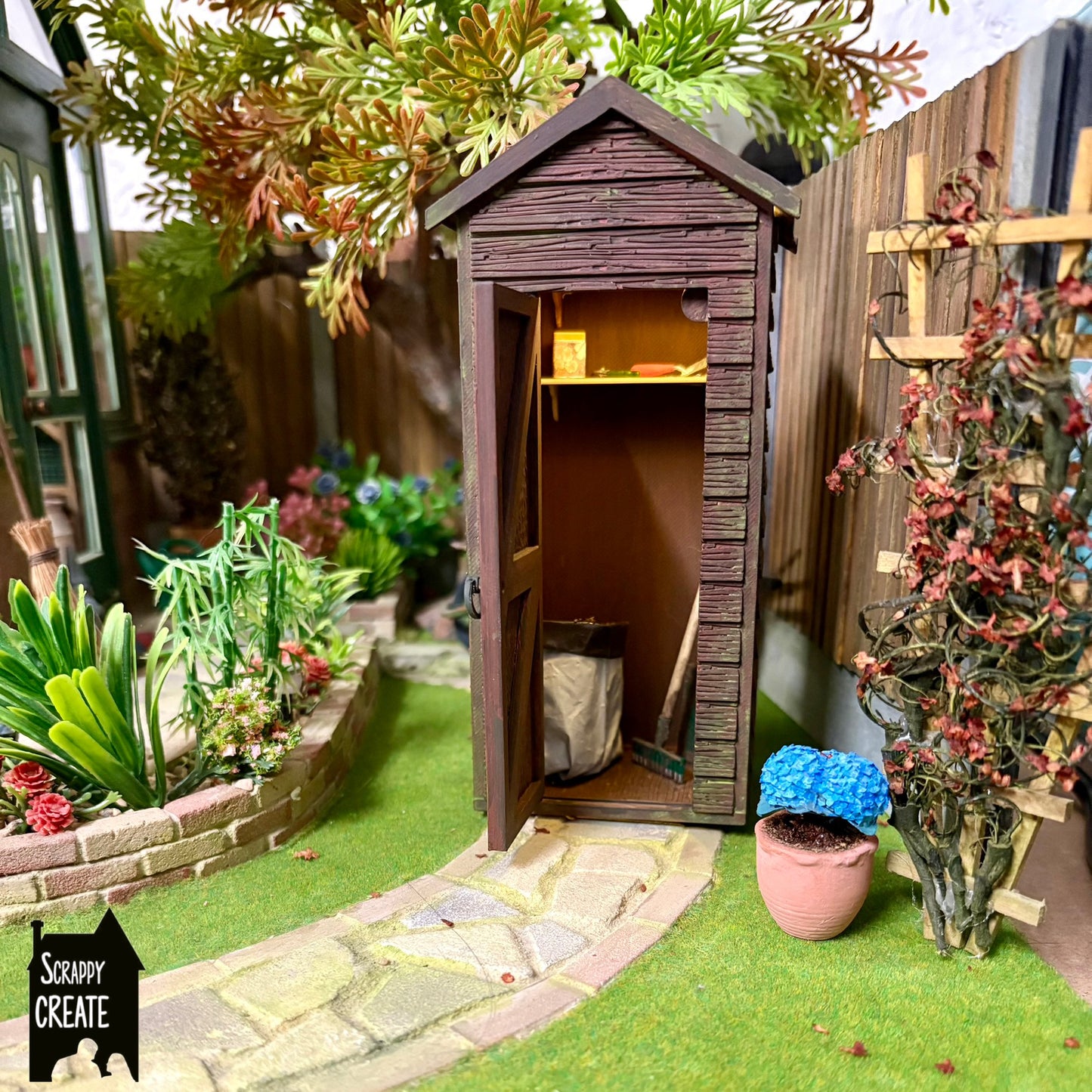 Garden tool shed with light