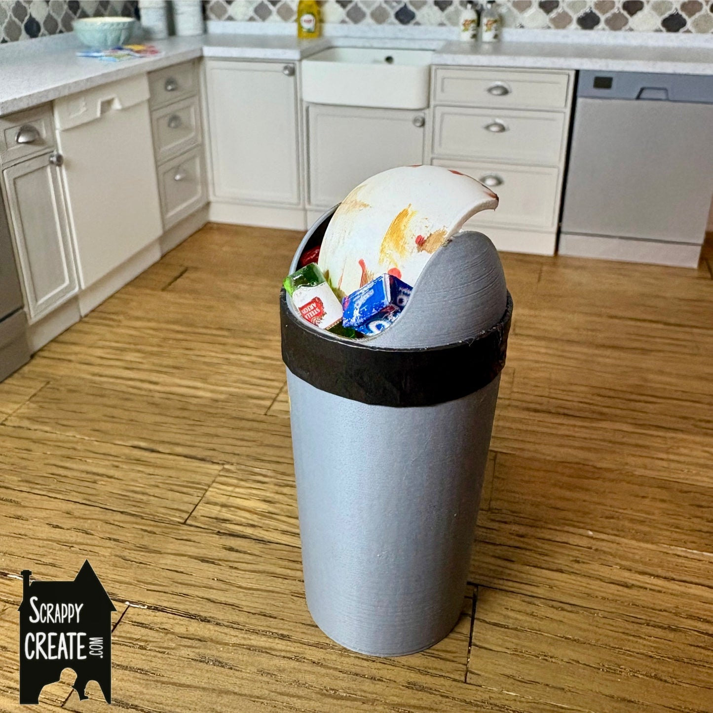 Dirty grey bullet kitchen bin