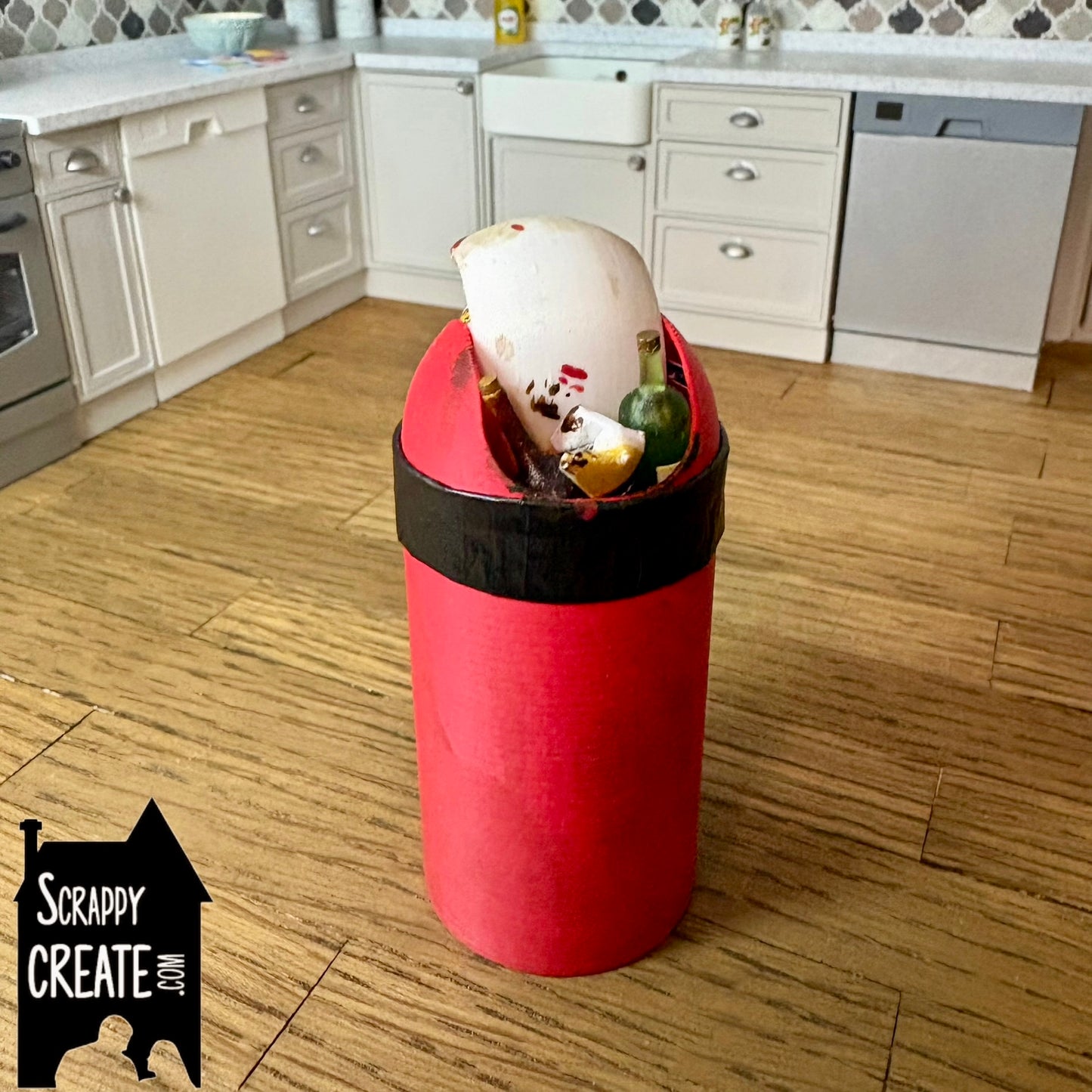 Dirty red bullet kitchen bin